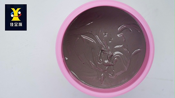 The lead-free solder paste in the red bottle has no cap when viewed from above
