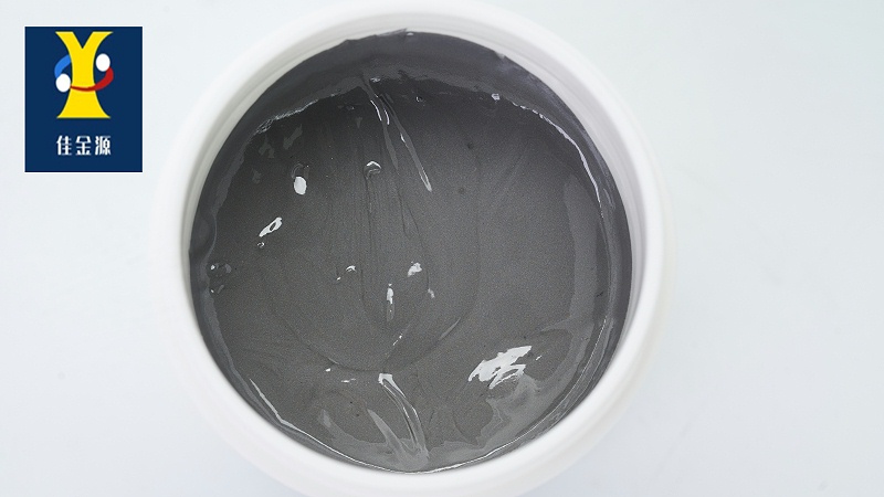 A white bottle with leaded solder paste is looking down